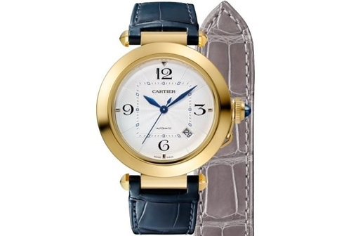 Reloj Pasha con bisel de oro amarillo y dos correas de piel intercambiables.